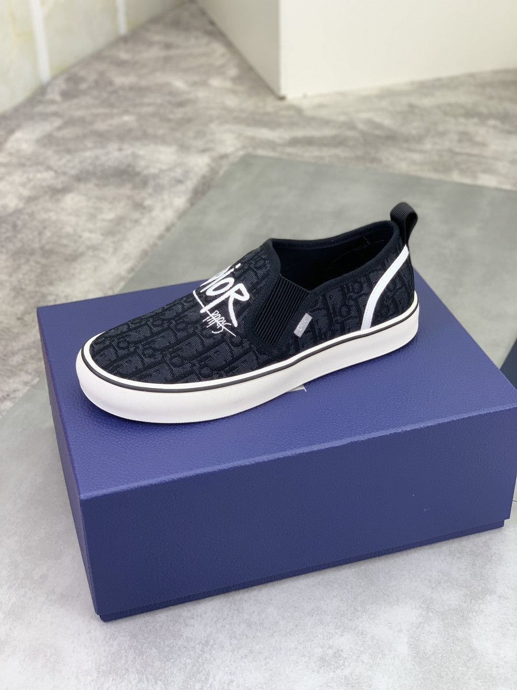 Dior Logo-Pattern Canvas Slip-On Sneakers - Black and White