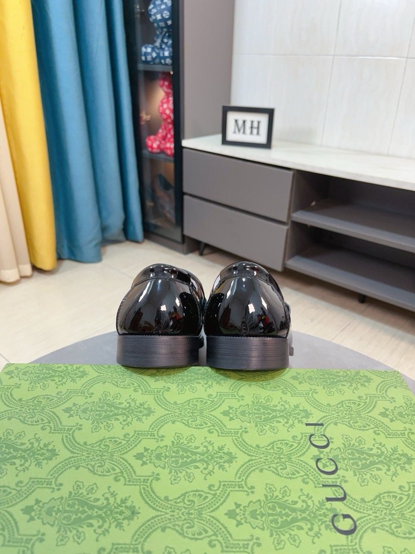 Gucci Embossed Metal-Hardware Loafers